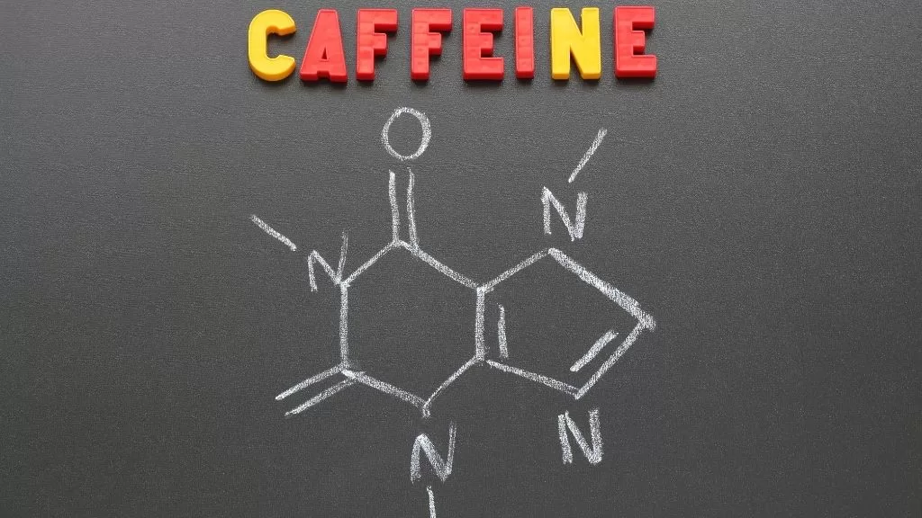 Napis "Caffeine" oznaczający "Kofeina", oraz wzór chemiczny kofeiny