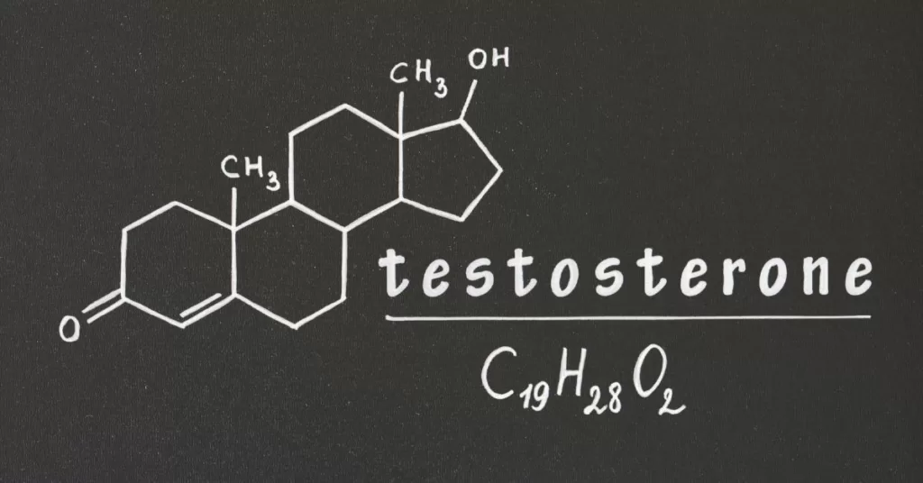 Grafika przedstawia napis "testosterone" oznaczający testosteron, oraz jego wzór chemiczny